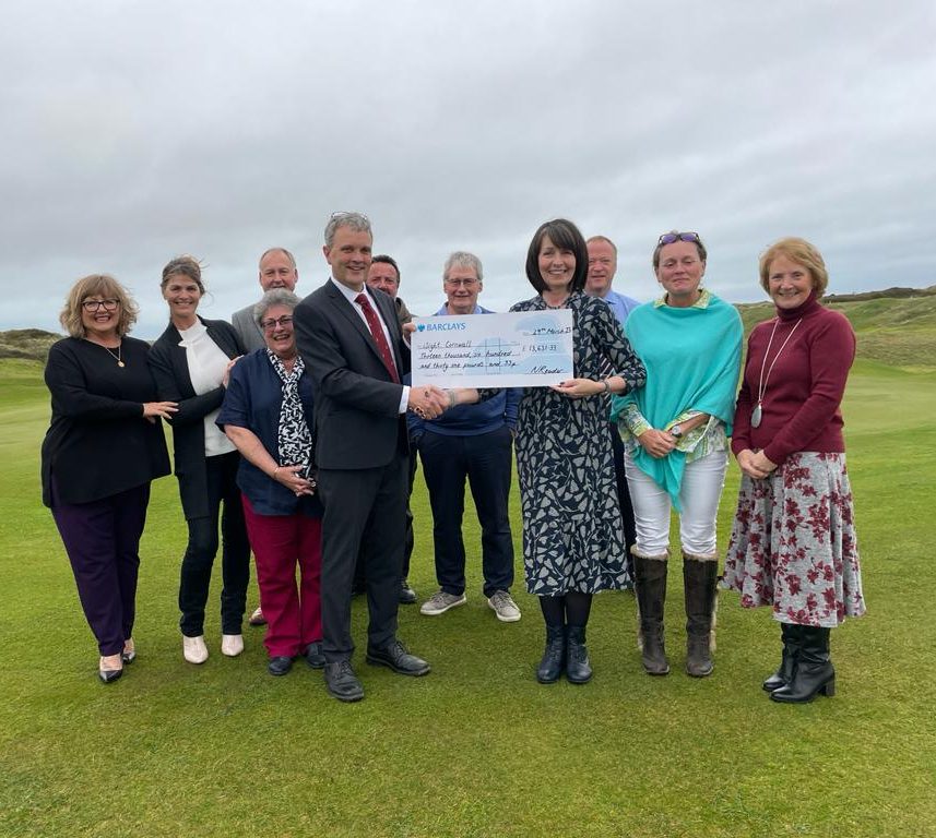 Cheque Being Presented To Isight Cornwall