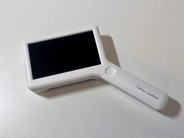 A white rectangular device with a screen with a white smooth handle